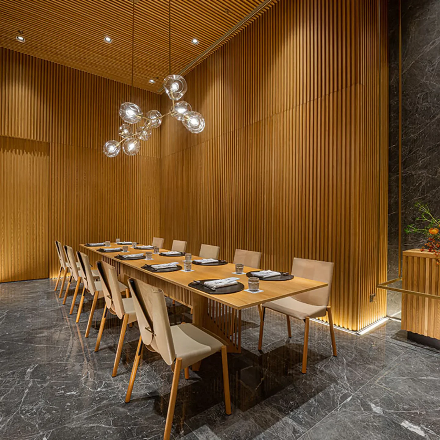 Elegant dining room interior at Zuicho restaurant in Macau, featuring modern design.